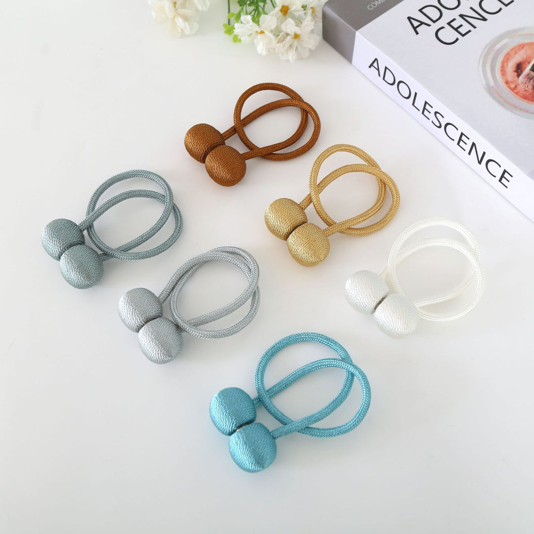 Decorative curtain tieback Bowlift