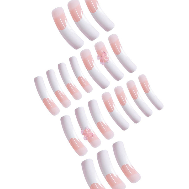Elegant Nail Art Enhancements with Decorative Bow Accents Bowlift