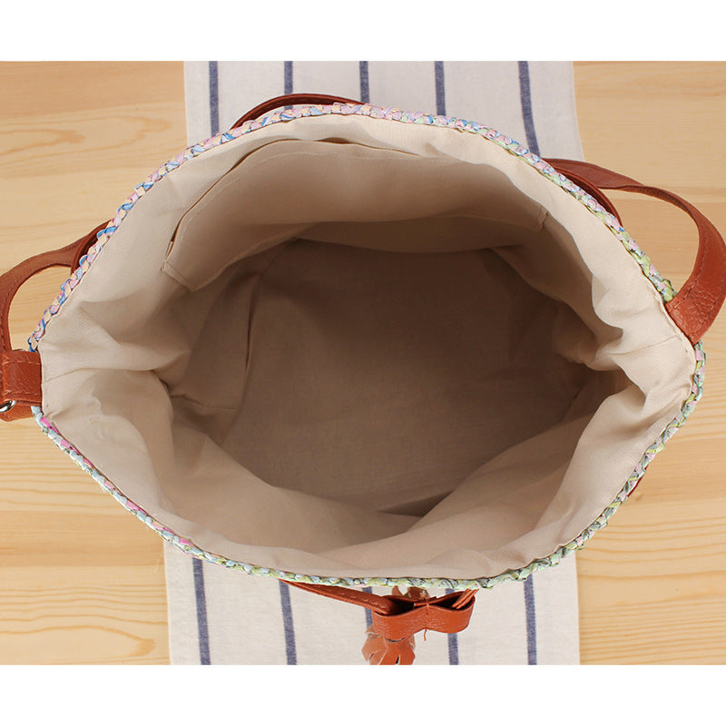 Shoulder bag made of hand-woven natural material with stylish leather accents Bowlift