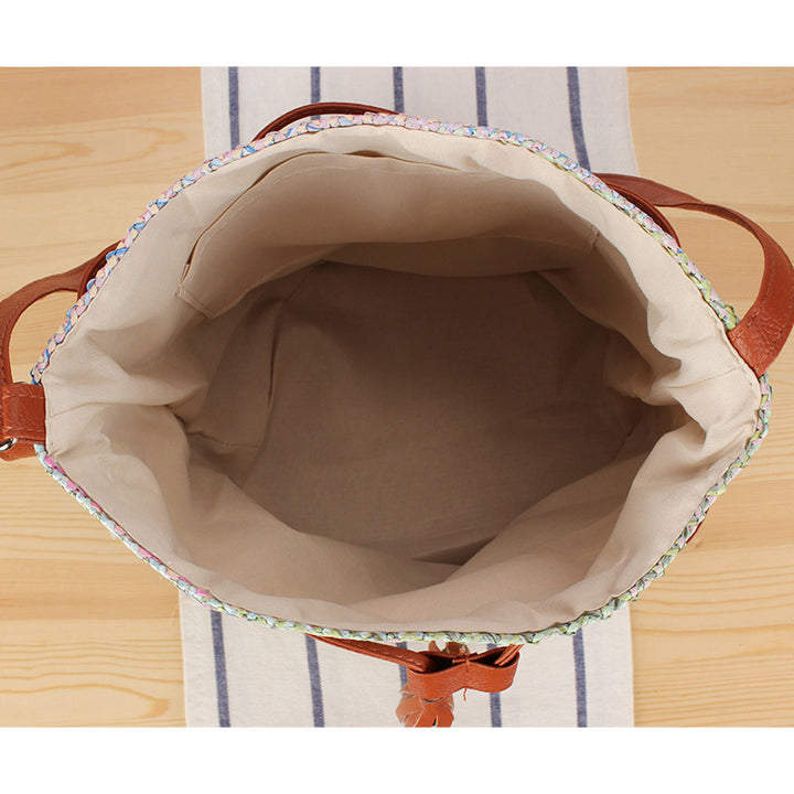 Shoulder bag made of hand-woven natural material with stylish leather accents Bowlift