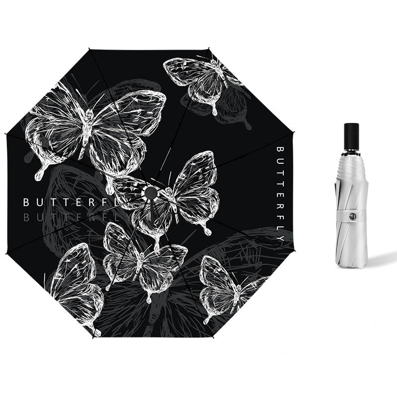 Ladies' compact folding umbrella with delicate butterfly design Bowlift