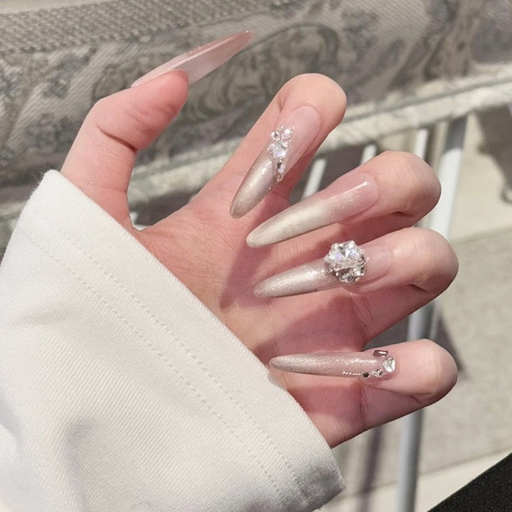 Artificial nail set with elegant tips and crystal accents Bowlift