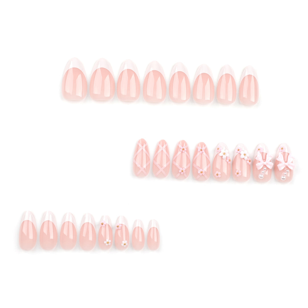 Artful nail art with delicate bows and floral accents Bowlift
