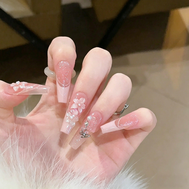 Artificial nail set with festive gift design and elegant glitter accents Bowlift