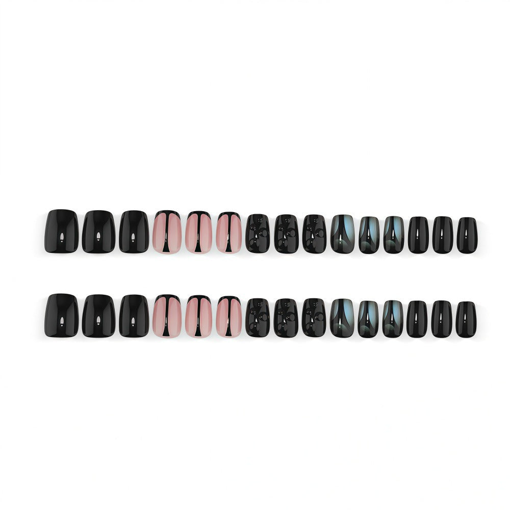 Artificial nails with elegant black and pastel accent design Bowlift