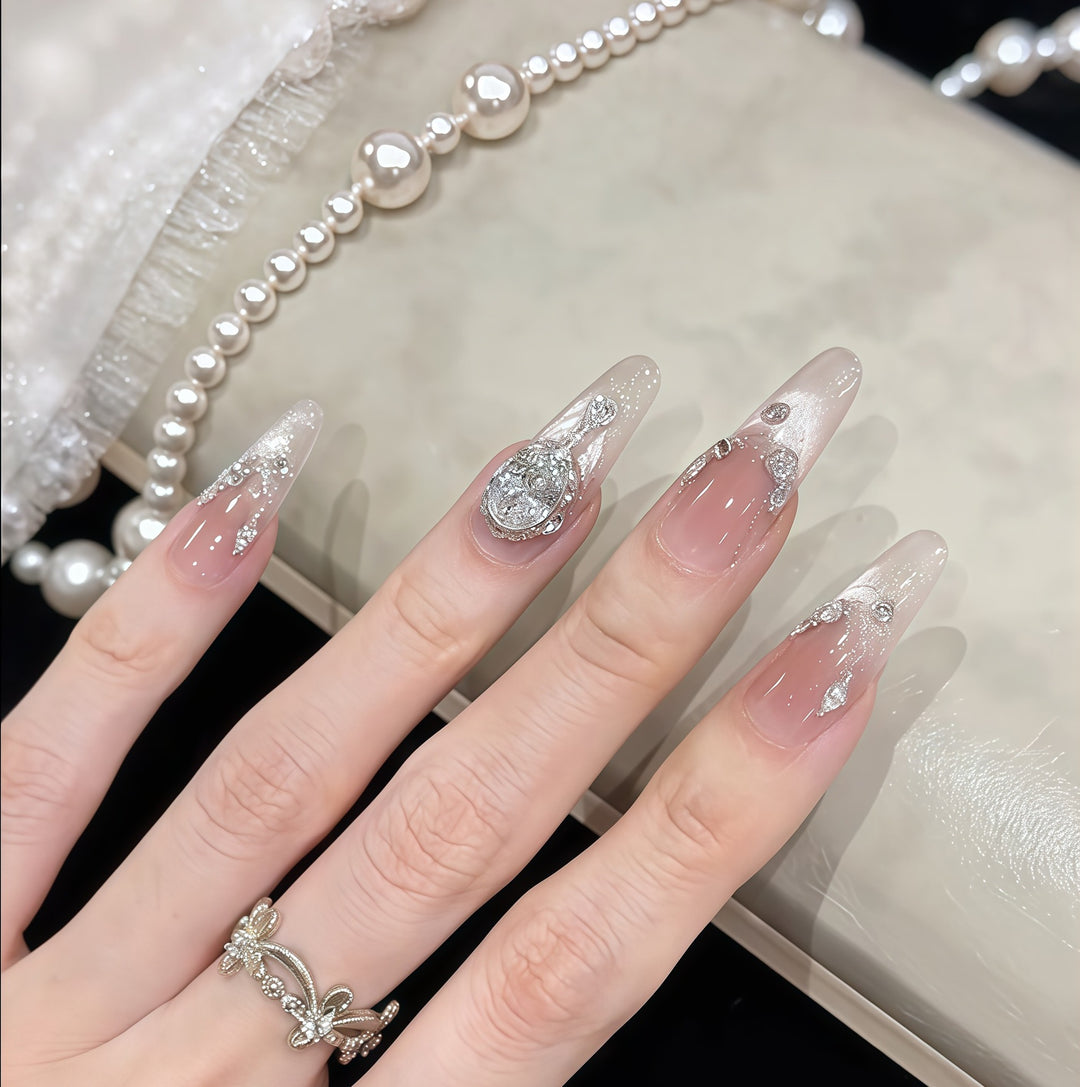 Glamorous artificial nail tips with rhinestone accents Bowlift
