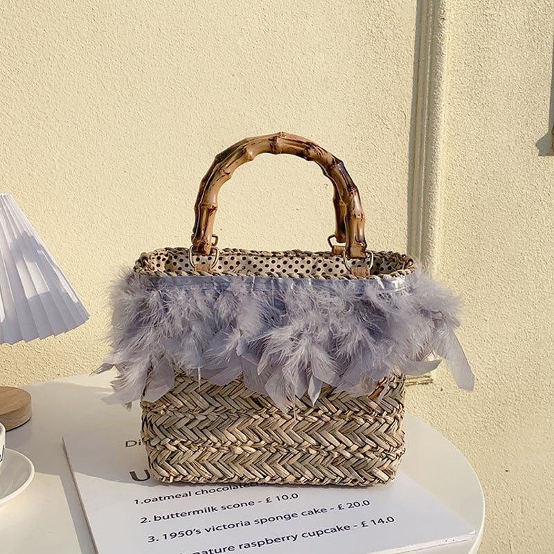 Elegant handbag with feathers and bamboo handles Bowlift