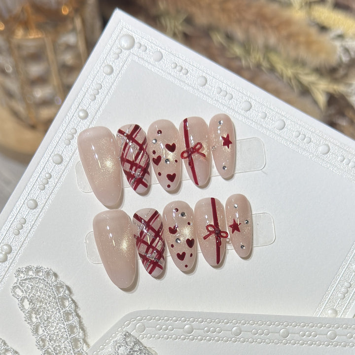 Romantic Themed Press-On Nail Set with Heart and Bow Accents Bowlift