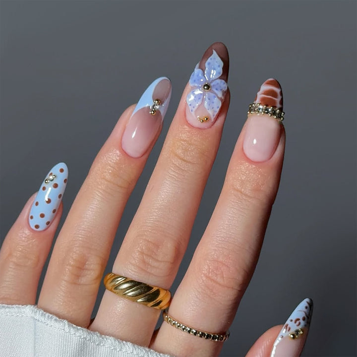 Artificial nails with creative floral and geometric designs Bowlift