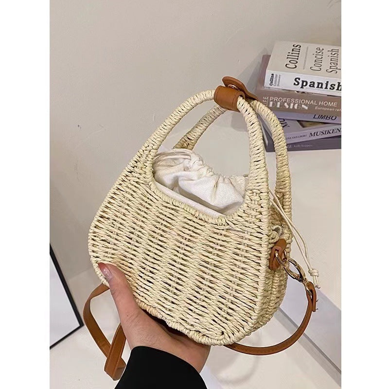 Fashionable wicker handbag with elegant leather detail Bowlift