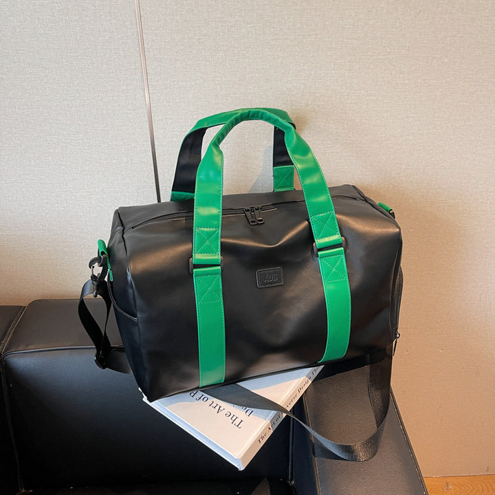 Sporty duffel bag with durable water-repellent material and versatile carrying options Bowlift