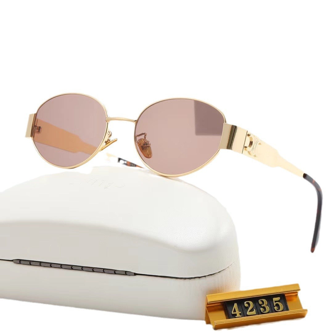 Women elegant oval sunglasses with gold-colored frame Bowlift