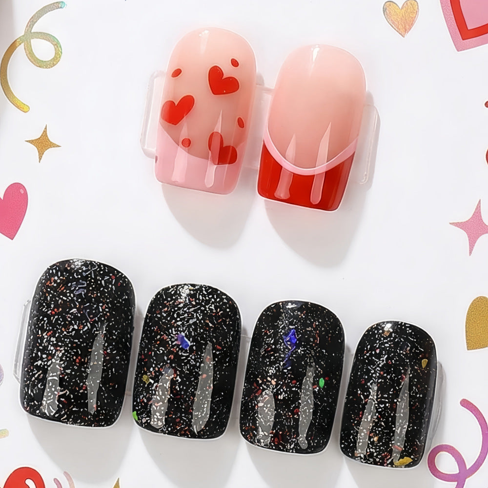 Creative artificial nails with heart design and glitter effects Bowlift