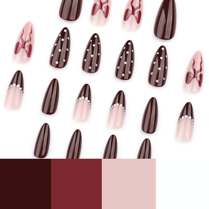 Elegantly designed stiletto nails with artistic accents Bowlift