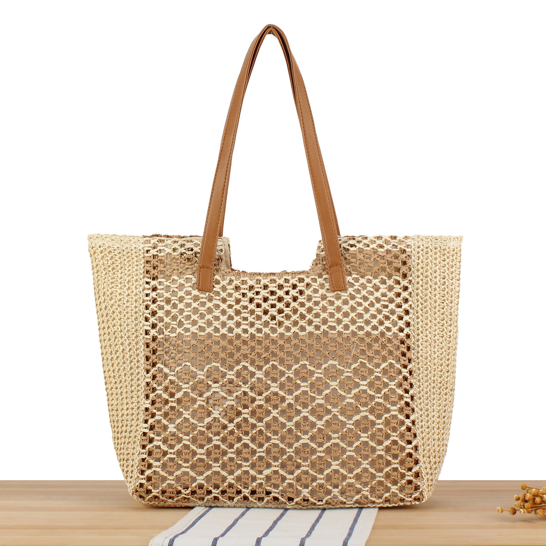 Shopping bag made of woven natural material with elegant leather handles Bowlift
