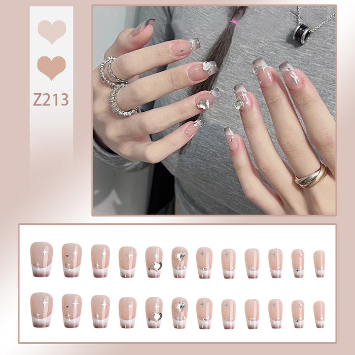 Acrylic nail set with sparkling crystal decorations Bowlift