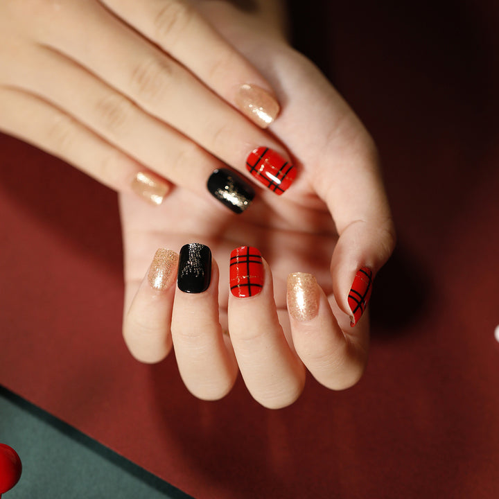 Elegant artificial nails with golden accents and floral design Bowlift