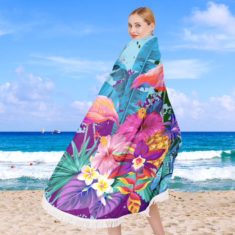 Round beach towel with tropical leaf print and fringe decoration Bowlift
