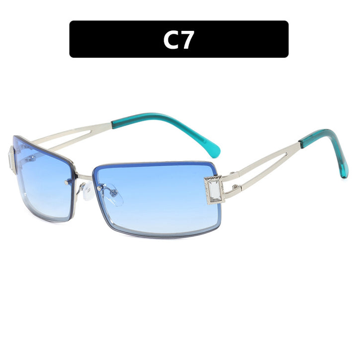 Ladies stylish sunglasses with elegant trapezoidal lenses and filigree metal frame Bowlift