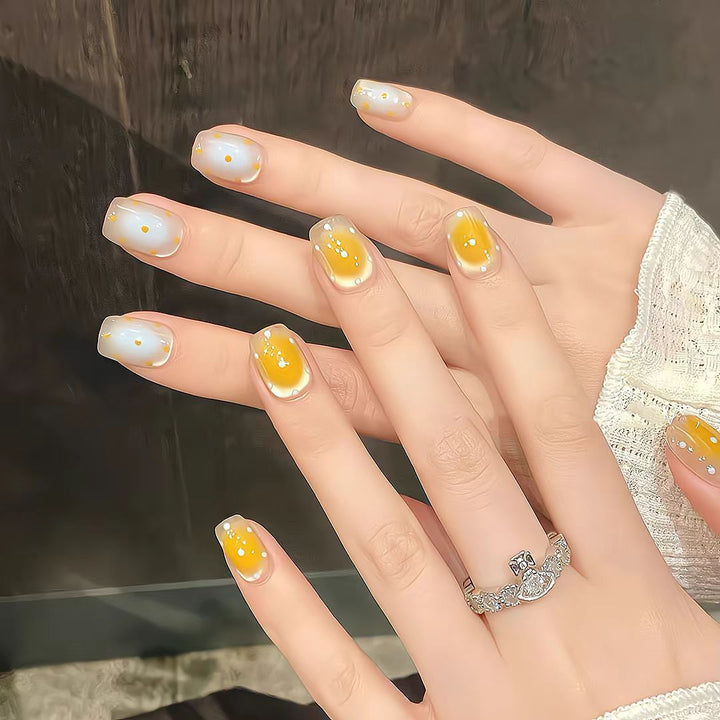 Artistic Press-On Nail Set with Whimsical Dot Designs Bowlift