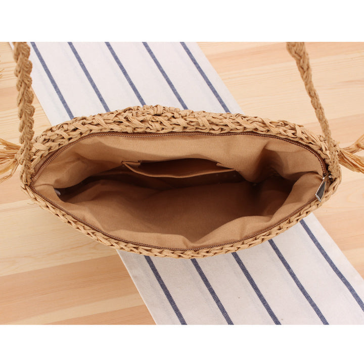 Handcrafted macrame shoulder bag with fringed design Bowlift