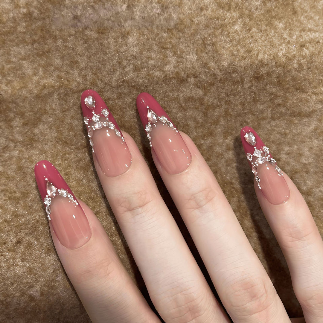 Artificial nails with sparkling rhinestone accents Bowlift