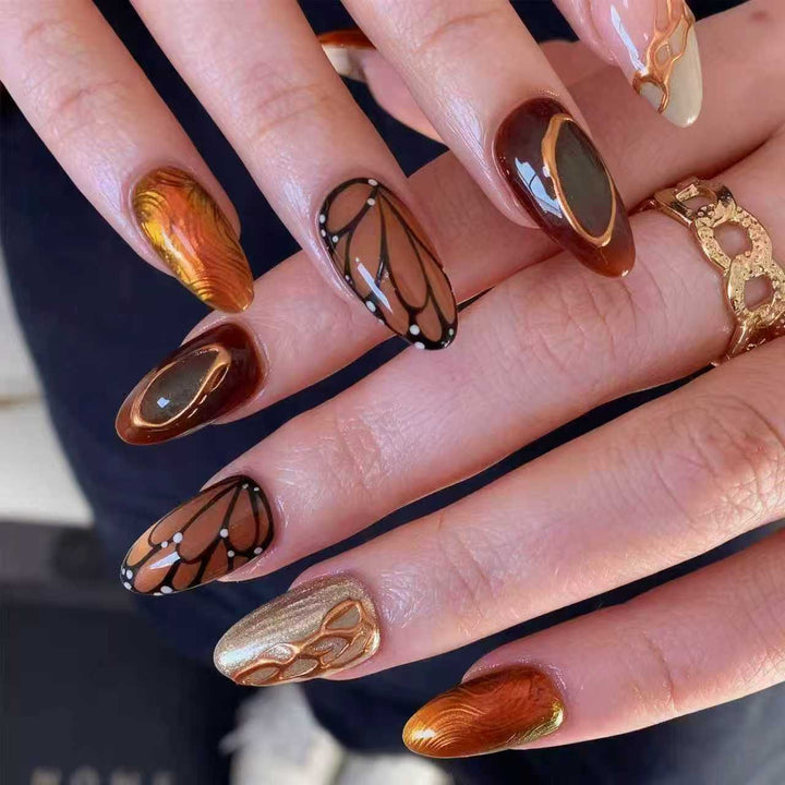 Artificial nail set with elegant gold and black design Bowlift