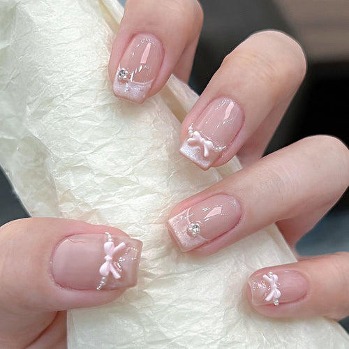 Elegant French Tip Press-On Nail Art with Bow Accents Bowlift