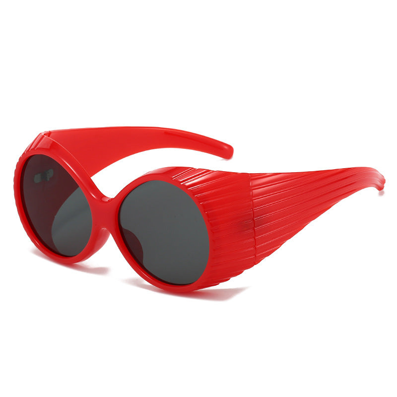 Women's extravagant sunglasses with unique wave design Bowlift
