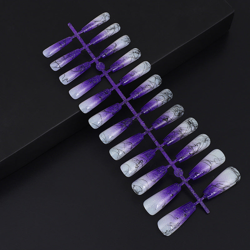 Artificial nails in modern ombre design with marbled accents Bowlift