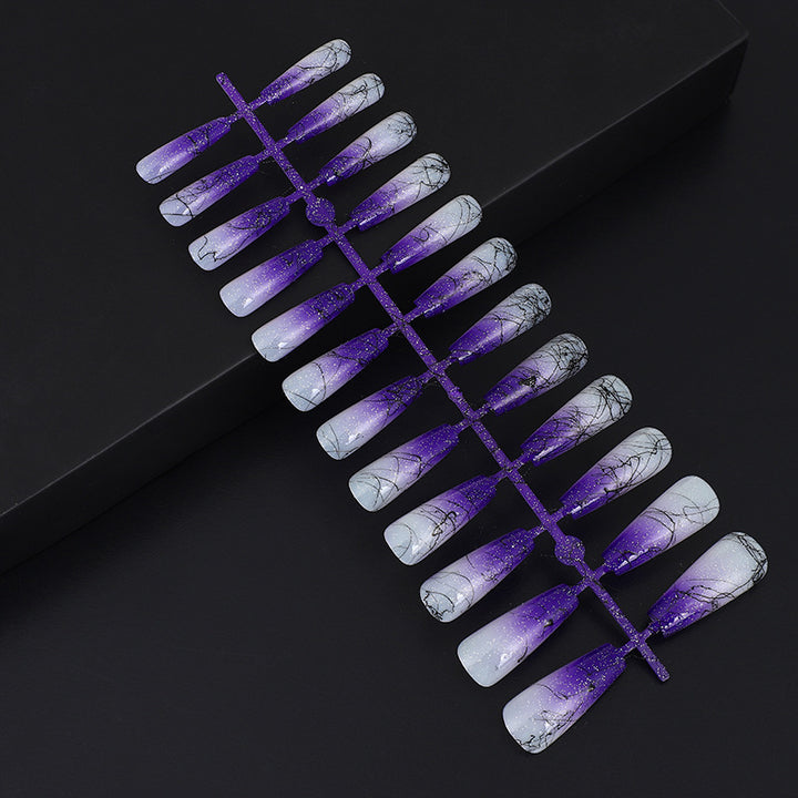 Artificial nails in modern ombre design with marbled accents Bowlift