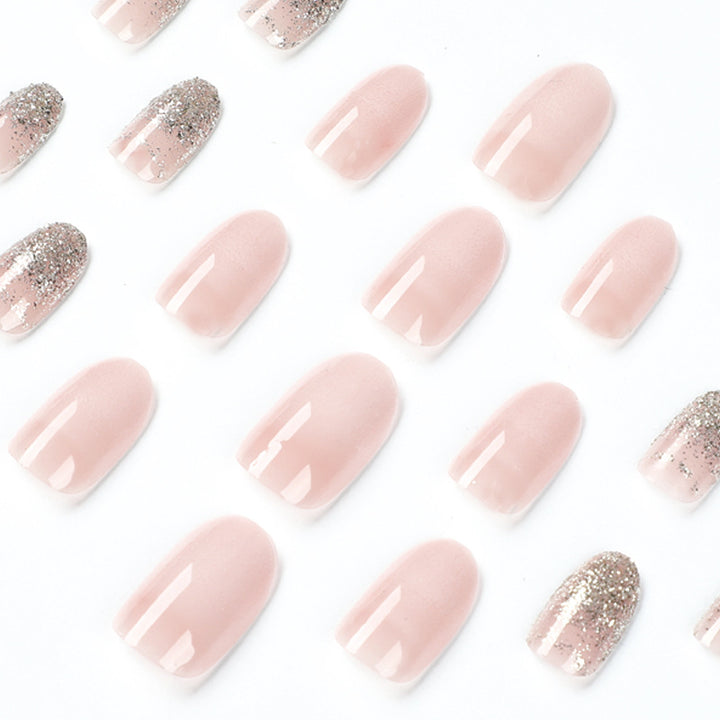 Artful nail art with rhinestone embellishments and elegant gradient color Bowlift