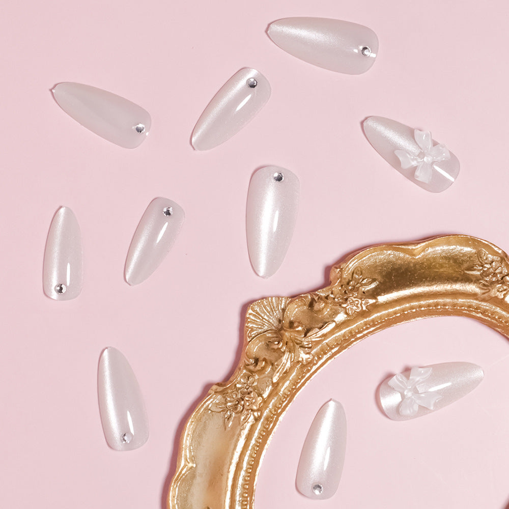 Elegant Stiletto-Shaped Press-On Nails with Decorative Bow Accents Bowlift