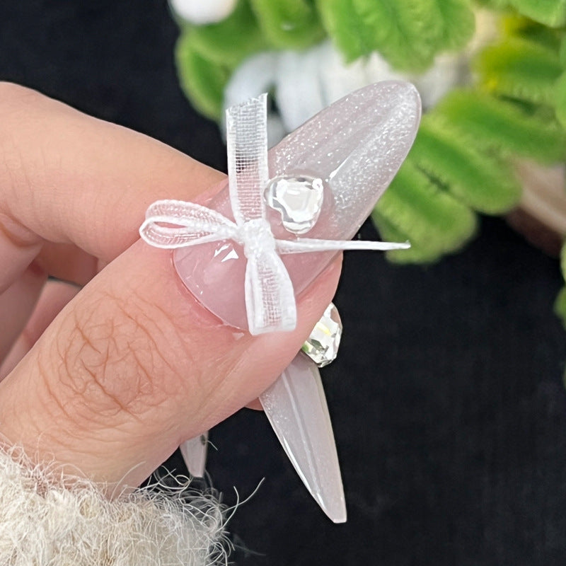 Decorative Stiletto Press-On Nails with Rhinestone Embellishments Bowlift