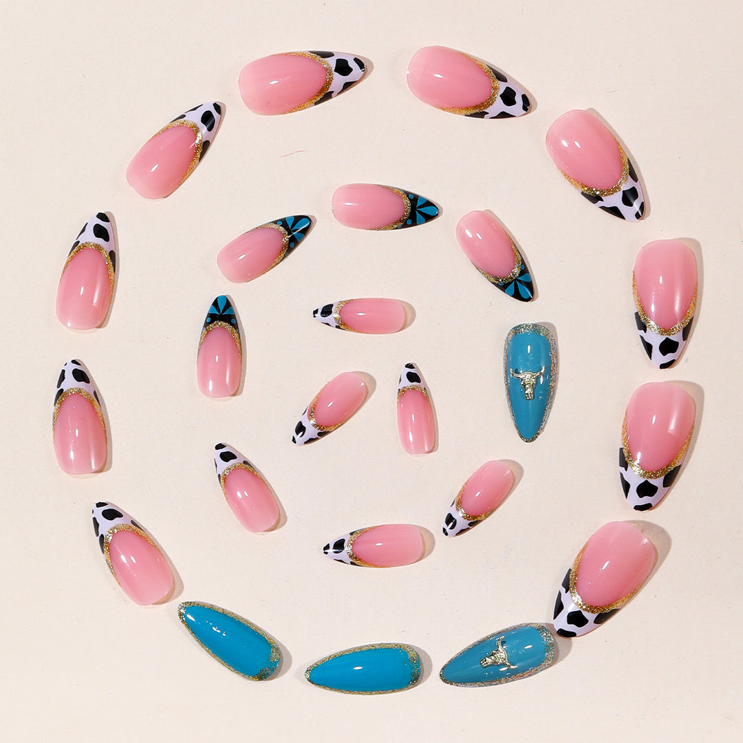 Artistic Stiletto Nail Art Extensions with Cow Print and Gold Accents Bowlift