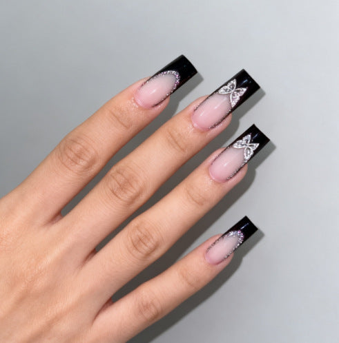 Glamorous artificial nails with detailed decorations Bowlift
