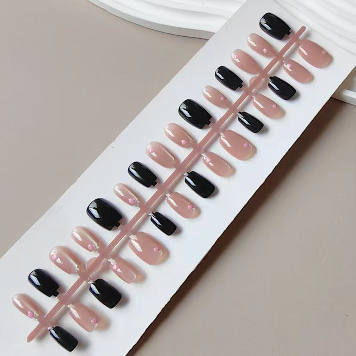 Artificial nails in elegant black-pink design Bowlift