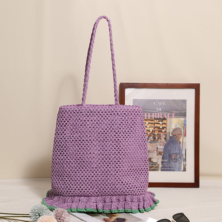 Handcrafted straw bag with fringed hem Bowlift
