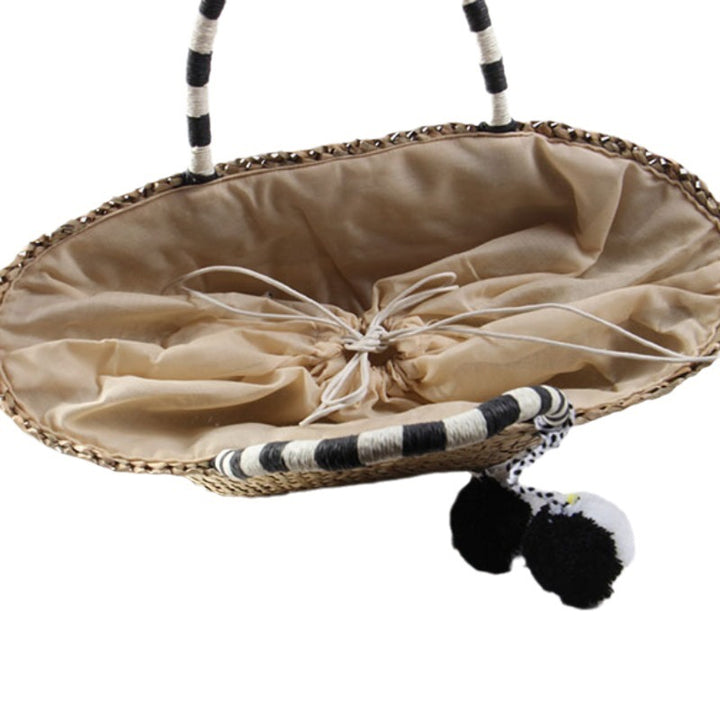 Braided beach bag with decorative pompons Bowlift