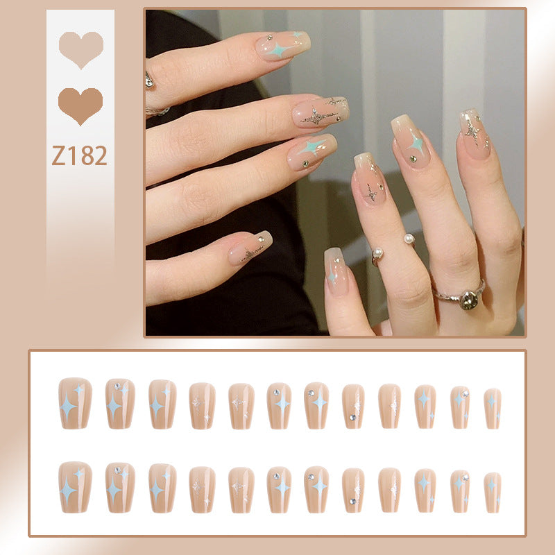 Acrylic nail set with sparkling star and glitter elements Bowlift