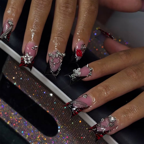 Artificial nails with glamorous 3D decorations and noble accents Bowlift