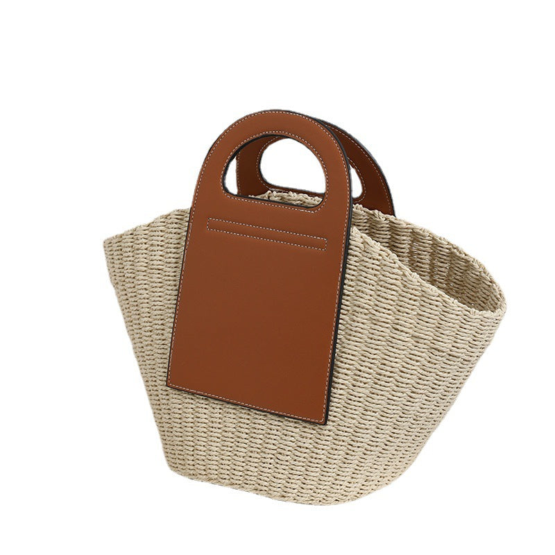 Fashionable basket bag with elegant leather accents Bowlift