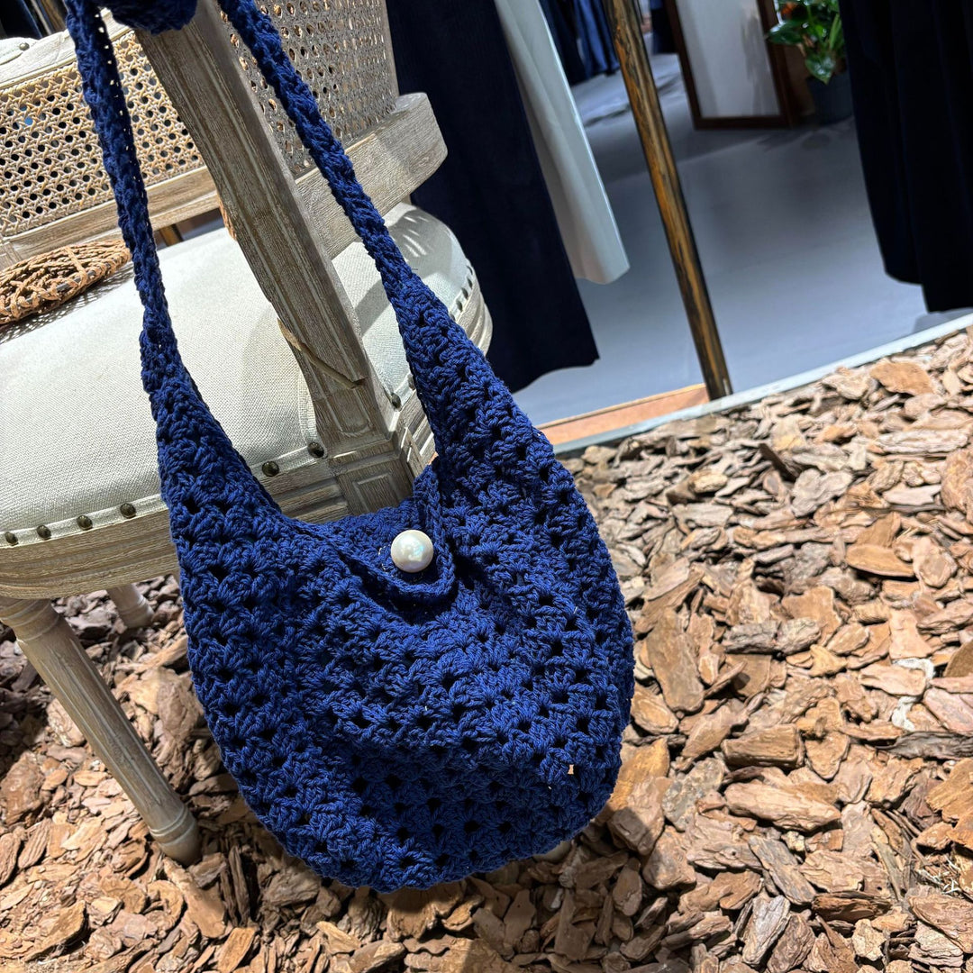 Hand-knotted shoulder bag with bead closure Bowlift