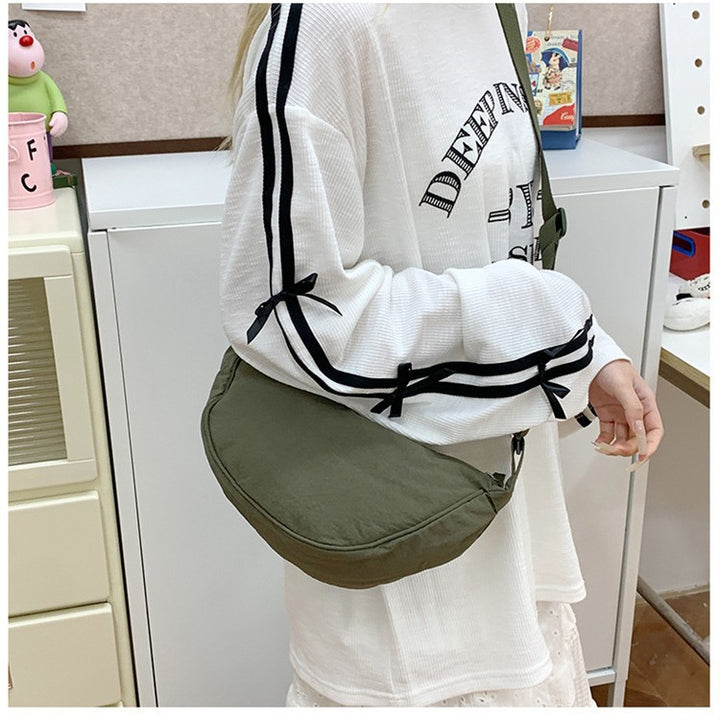 Shoulder bag with adjustable shoulder strap and practical compartments Bowlift