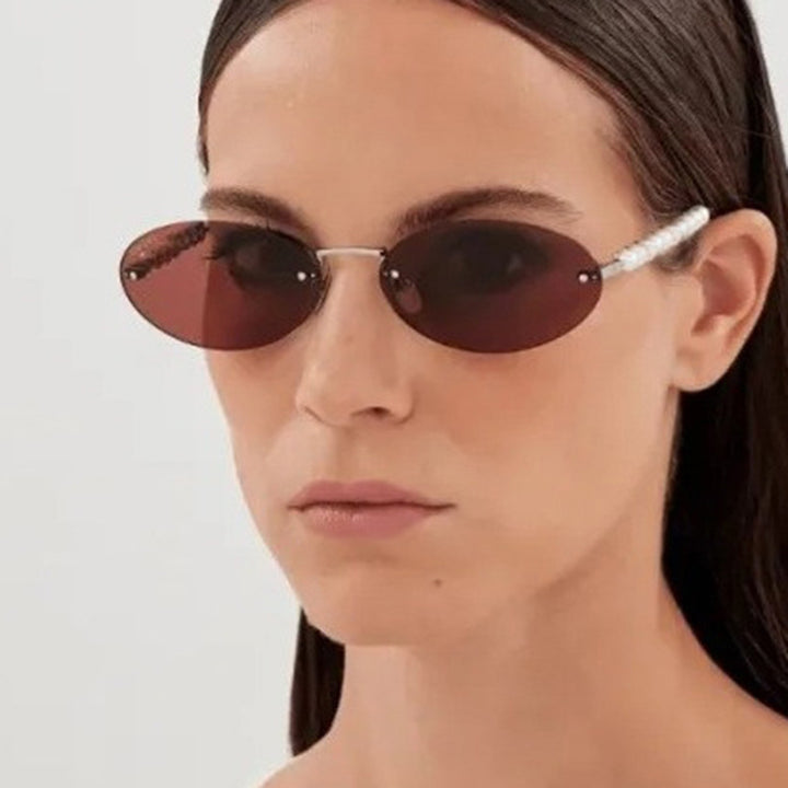 Women's stylish oval sunglasses with elegant embellishments Bowlift