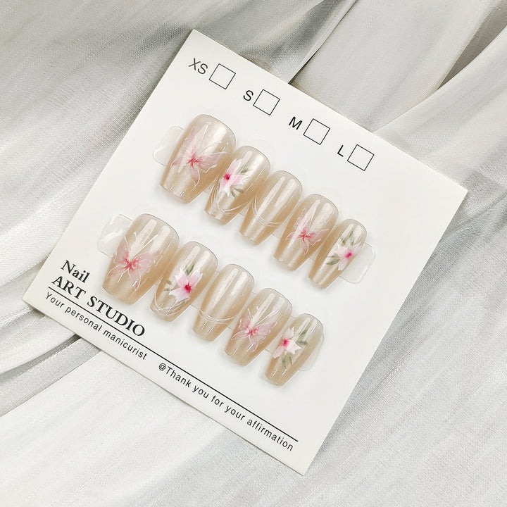 Artificial nail tips with shimmering design Bowlift