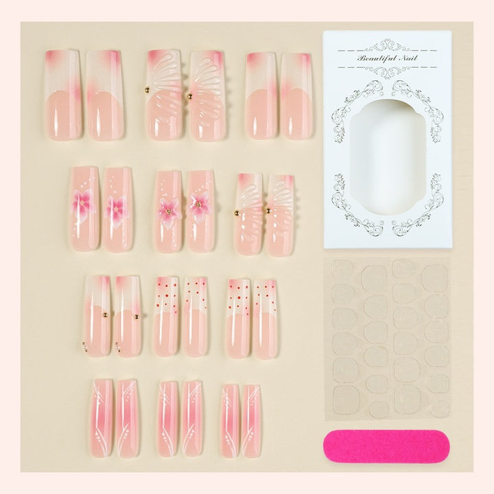 Artificial nail set with delicate flower and glitter accents Bowlift