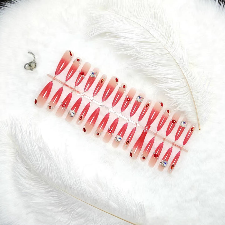 Glamorous artificial nails with sparkling ombre effect and elegant embellishments Bowlift