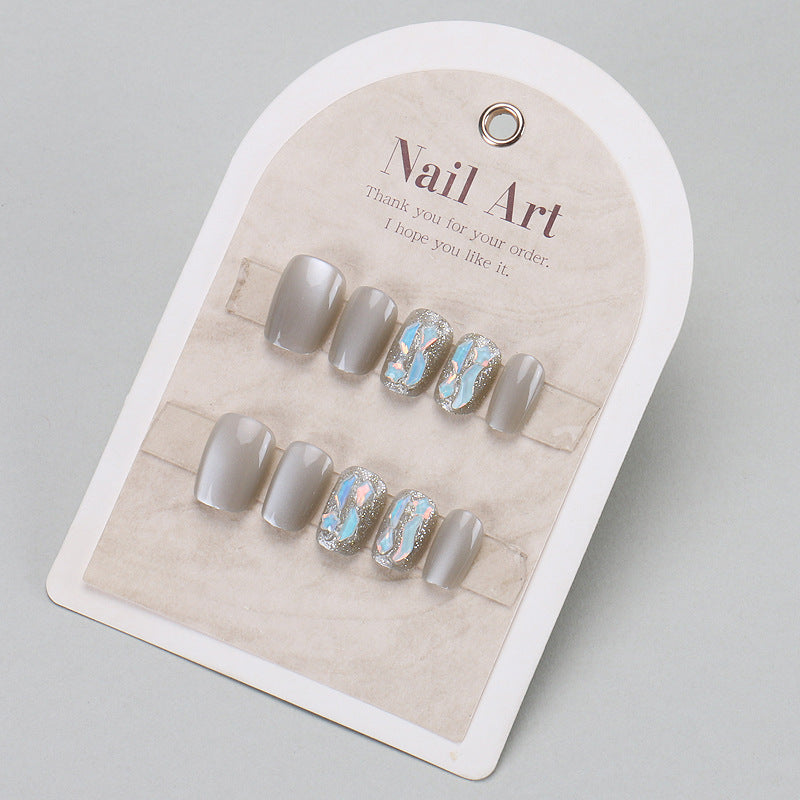 Elegant Press-On Nail Set with Artistic Designs Bowlift