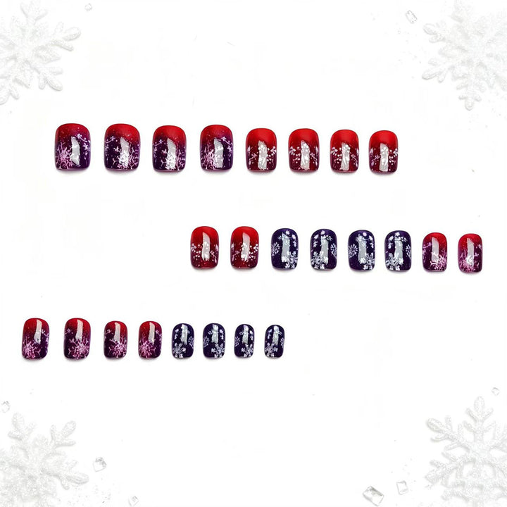 Artificial nails with festive glitter effect and wintry snow motif Bowlift